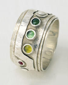 Split silver band with four stones